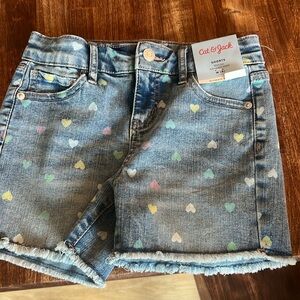 Cat and jack denim shorts with hearts. New. Size 8.